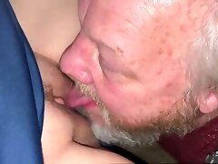 While the cuckold licks up the cum, the